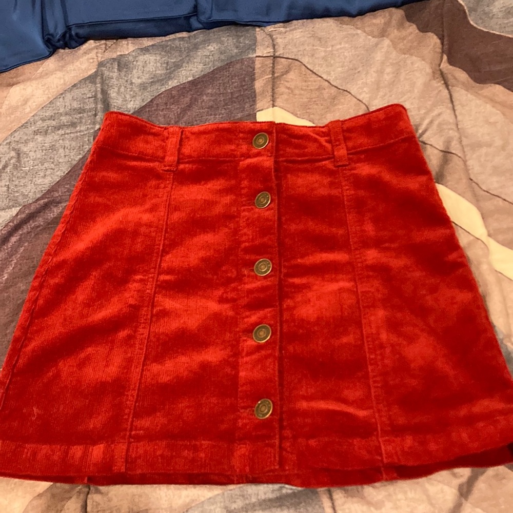 Cute button up skirt super comfy and barely worn. :)